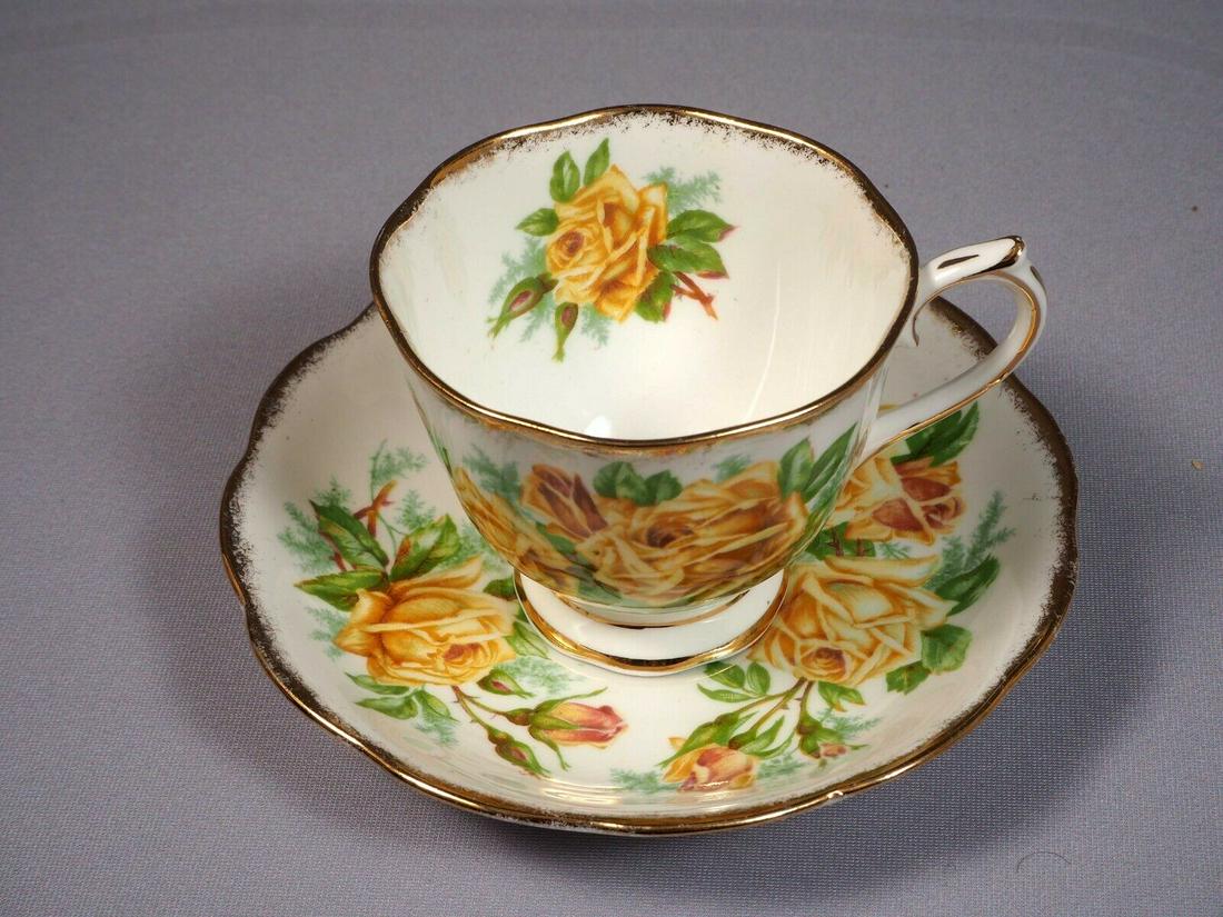 Royal Albert Yellow Tea Rose Bone China Coffee Tea cup Saucer England Larger: This an absolutely stunning Fine Bone China set of Tea/Coffee cup and Saucer, from the famous Yellow Tea rose Collection. The set is made by Royal Albert in England. It is properly marked with Royal A