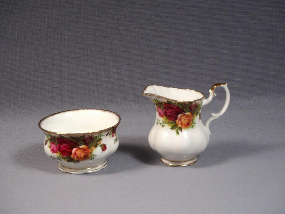 Royal Albert Old Country Roses Creamer Sugar Bowl set ENGLAND First edition: This is a gorgeous Bone China Creamer, Sugar Bowl and under plate from the renowned Royal Albert Old Country Roses collection - Made in England. The set is properly marked with Royal Albert back stamp