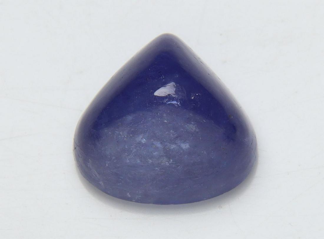 4.35 Cts Natural Tanzanite: No Reserve! Title: 4.35 Cts Natural Tanzanite Additional Information: Gemstone : Natural Tanzanite Origin: Tanzania Weight : 4.35 carats Dimensions : 9.46x9.87x6.35 mm Shape/Cut: Pear Cabochan Color :