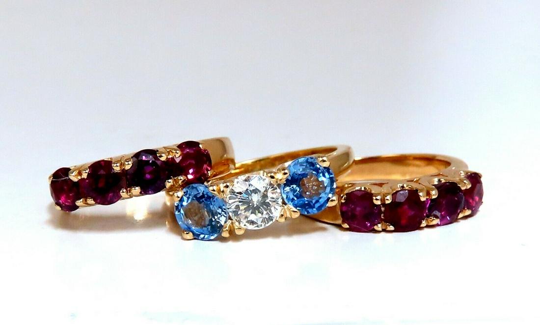 5.60ct Natural Ruby Sapphire Stackable Stacking Bands 14 Karat: stackable Rings 3.50ct. round cut Natural Rubies, 1.60ct (2) Sapphires .50ct Diamond G-color Vs-2 Clarity Three rings. (VS) Clean Clarity Transparent & Vivid colors. 14kt yellow gold 11.6 grams. Rings