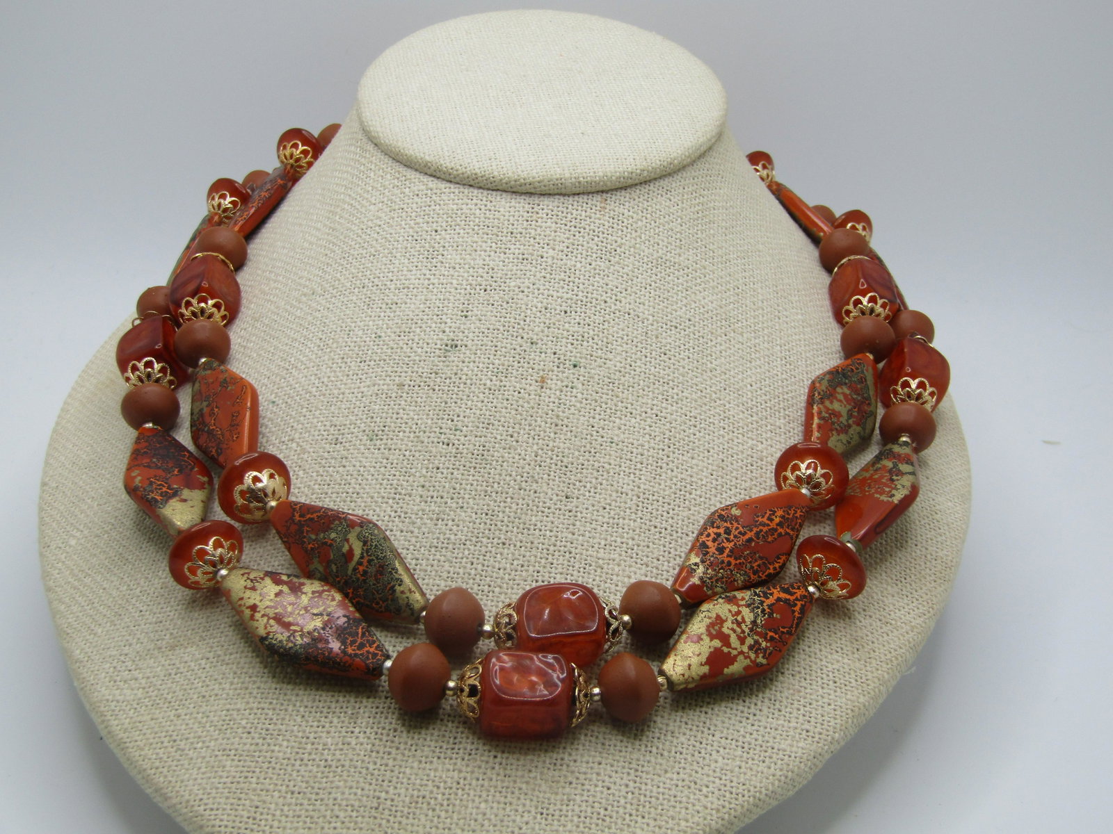 Vintage Orange/Gold Pringed Necklace, 1950's-1960's Hong Kong, 19"-22": Vintage Orange/Gold Pringed Necklace, 1950's-1960's Hong Kong, 19"-22". This has elongated diamond shaped 4.5mm thick beads that have a sponged gold painted accent and also orange and black that has t