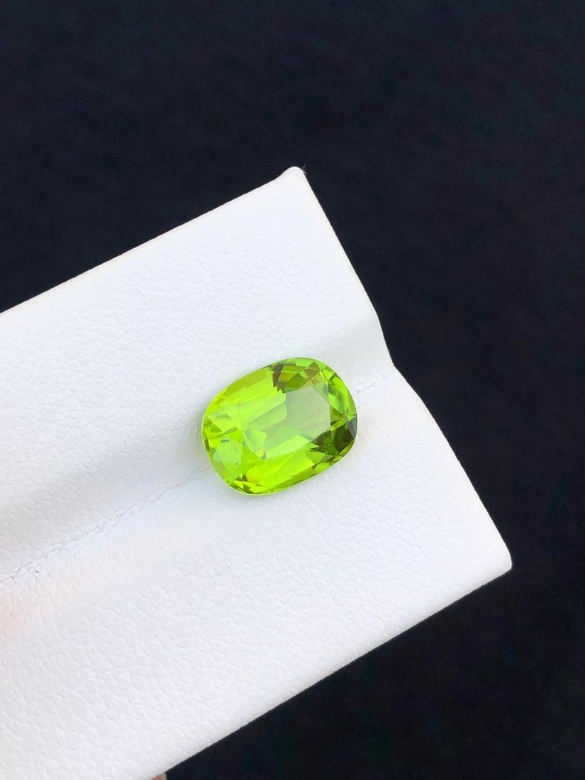 3.5 Carats Natural Green Peridot from Pakistan: Title: 3.5 Carats Natural Green Peridot from Pakistan Weight: Pakistan Origin: Peridot Materials: 3.5 Carats Size: 10x8x5.5 MM Description: No Heated No Treated Reserve: $199.00 Shipping: Dome