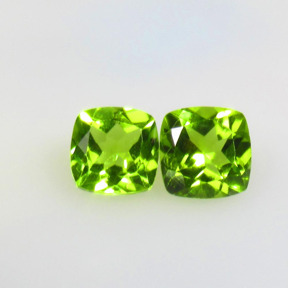 3.55 Ctw Natural Pakistan Peridot Cushion Pair: No Reserve! Title: 3.55 Ctw Natural Pakistan Peridot Cushion Pair Stone Clarity: VVS Gemstones: Natural Peridot Carat Weights: 3.55 Size/Dimensions: 7.10 x 7.10 x 5.00 mm / 2 Pc's Additional Informati