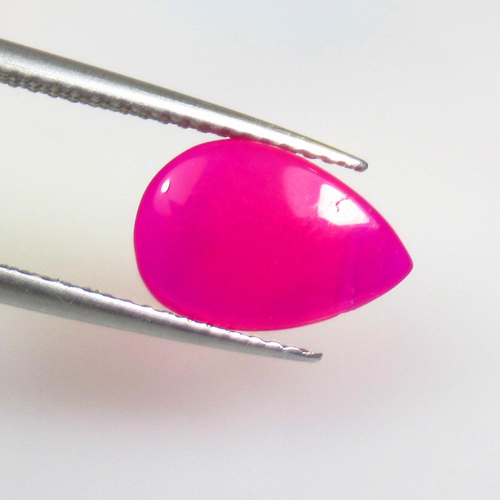 2.31 Ctw Natural Drilled Pink Onyx Pear Cab: No Reserve! Title: 2.31 Ctw Natural Drilled Pink Onyx Pear Cab Stone Clarity: Opaque Gemstones: Natural Onyx Carat Weights: 2.31 Size/Dimensions: 11.70 x 8.00 x 3.40 mm Additional Information: Very Go