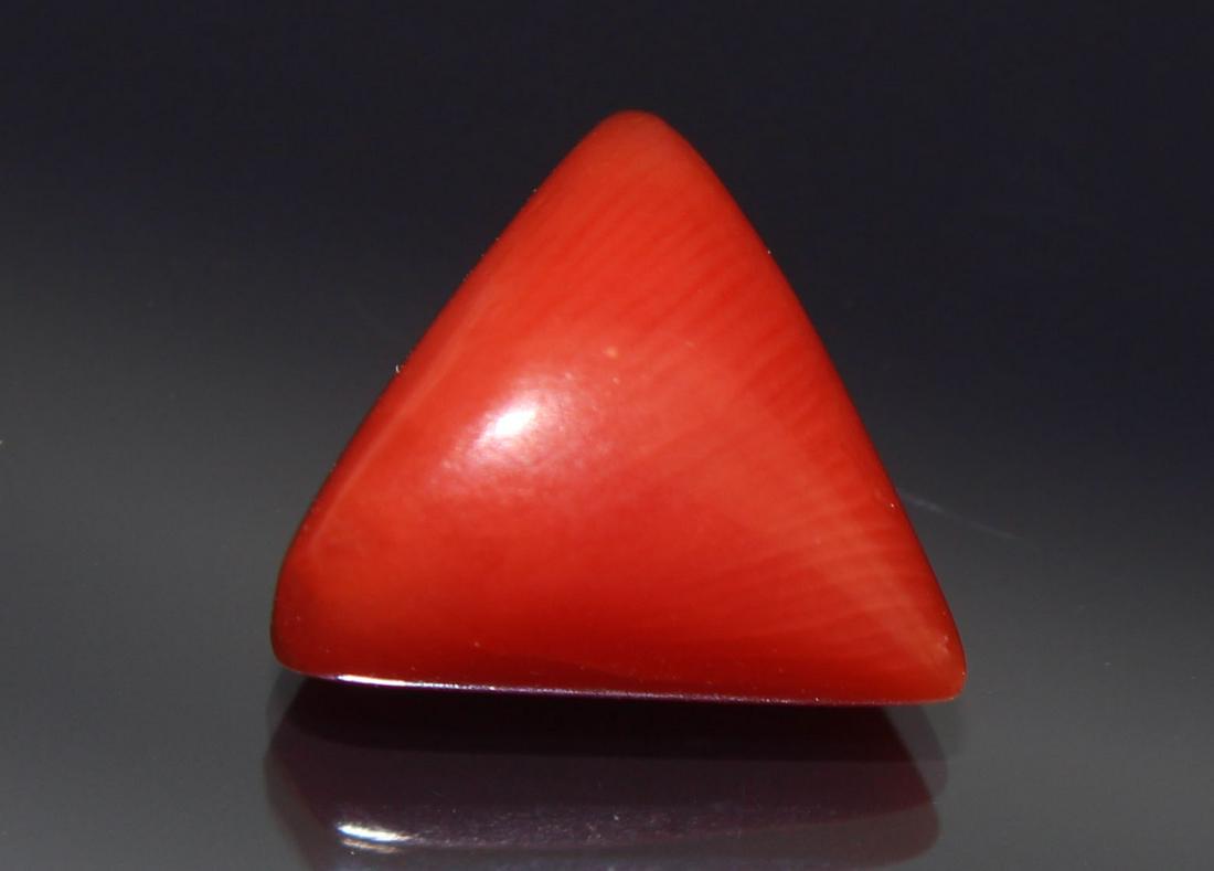 1.97 Cts Natural Coral: No Reserve! Title: 1.97 Cts Natural Coral Additional Information: Gemstone : Natural Coral Origin: Australia Weight : 1.97 carats Dimensions : 8x8 mm, Shape/Cut: Trillion Cabochan Color : Red Transpar