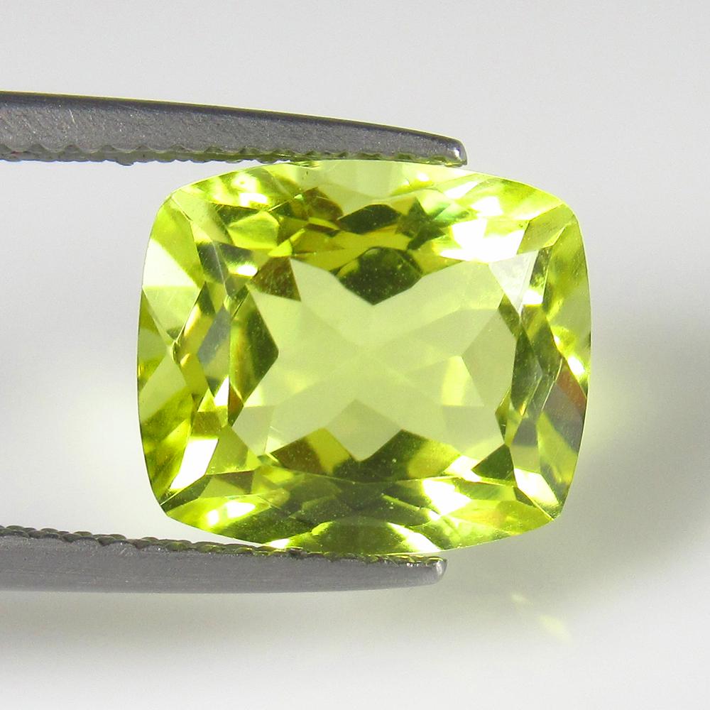 Natural Lemon Quartz - 5.28 Ct: No Reserve! Title: Natural Lemon Quartz - 5.28 Ct Origin: Africa Weight: 5.28 Size/Dimensions: 11.2 x 10.0 x 7.0 mm Additional Information: Pieces : 1 No's / Shape : Cushion Cut / Color : Greenish Yel