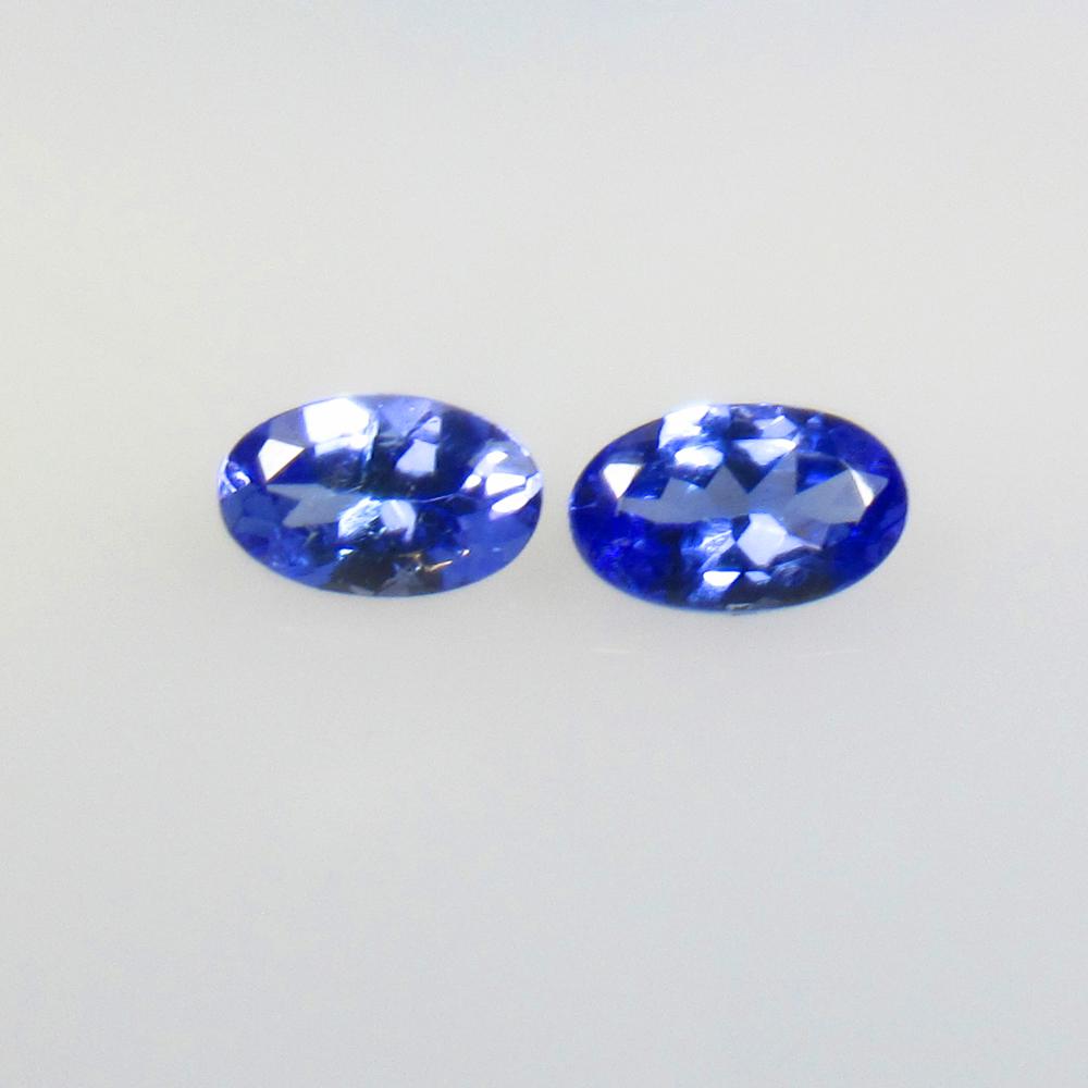 0.48 Ctw Natural Tanzanite Oval Pair: No Reserve! Title: 0.48 Ctw Natural Tanzanite Oval Pair Stone Clarity: VVS Gemstones: Natural Tanzanite Carat Weights: 0.48 Size/Dimensions: 5.10 x 3.20 x 2.50 mm / 2 Pc's Additional Information: Top 