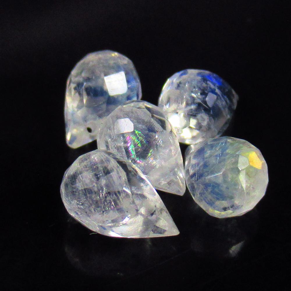 4.81 Ctw Natural 5 Drilled Blue Moonstone Pear Drop Beads: No Reserve! Title: 4.81 Ctw Natural 5 Drilled Blue Moonstone Pear Drop Beads Stone Clarity: Semi-Transparent Gemstones: Natural Moonstone Beads Carat Weights: 4.81 Size/Dimensions: 6.7x4.7 - 6.9x5.1 m