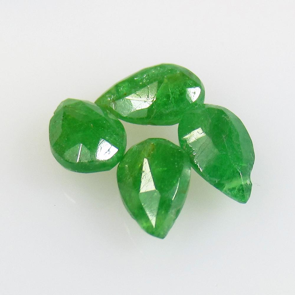 3.65 Ctw Natural 4 Tsavorite garnet Drilled Pear Beads: No Reserve! Title: 3.65 Ctw Natural 4 Tsavorite garnet Drilled Pear Beads Stone Clarity: Opaque Gemstones: Natural Tsavorite Beads Carat Weights: 3.65 Size/Dimensions: 7.2x5.0 - 7.5 4.5 mm / 4 Pc's Ad