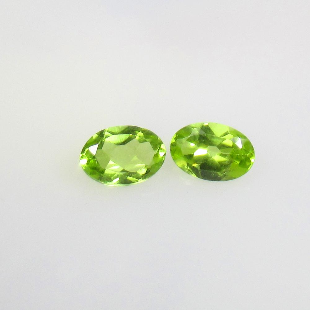 1.03 Ctw Natural Pakistan Peridot Oval Pair: No Reserve! Title: 1.03 Ctw Natural Pakistan Peridot Oval Pair Stone Clarity: VVS Gemstones: Natural Peridot Carat Weights: 1.03 Size/Dimensions: 6.10 x 4.10 x 2.50 mm / 2 Pc's Additional Information: