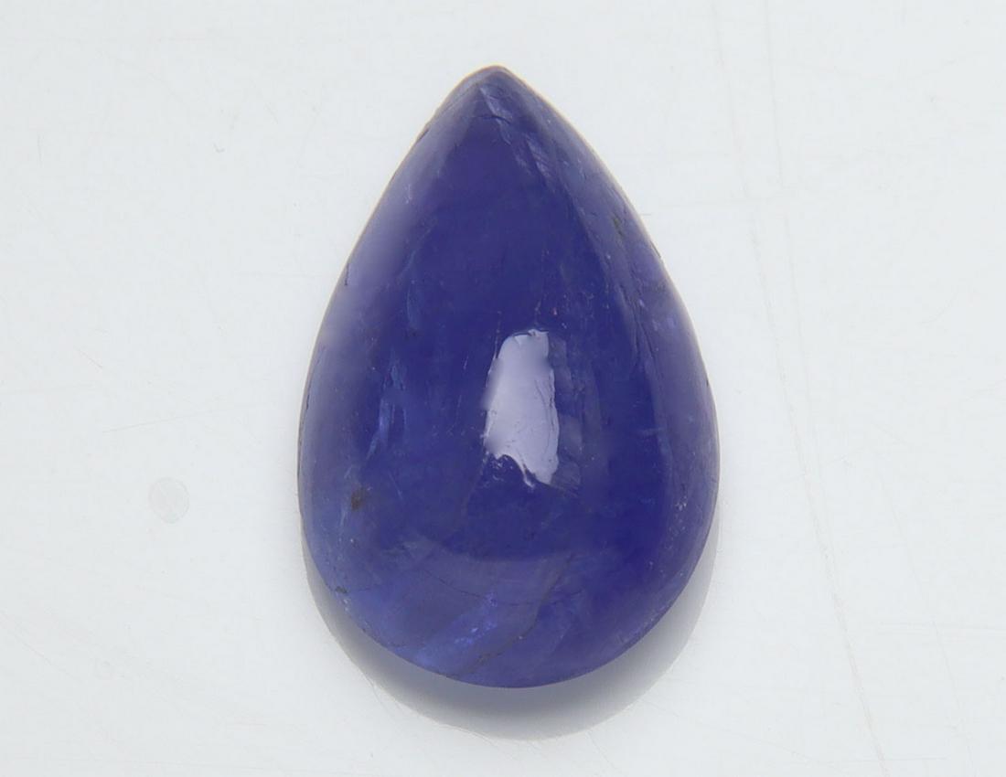 3.97 Cts Natural Tanzanite: No Reserve! Title: 3.97 Cts Natural Tanzanite Additional Information: Gemstone : Natural Tanzanite Origin: Tanzania Weight : 3.97 carats Dimensions : 13.14x8.33x4.82 mm Shape/Cut: Pear Cabochan Color 