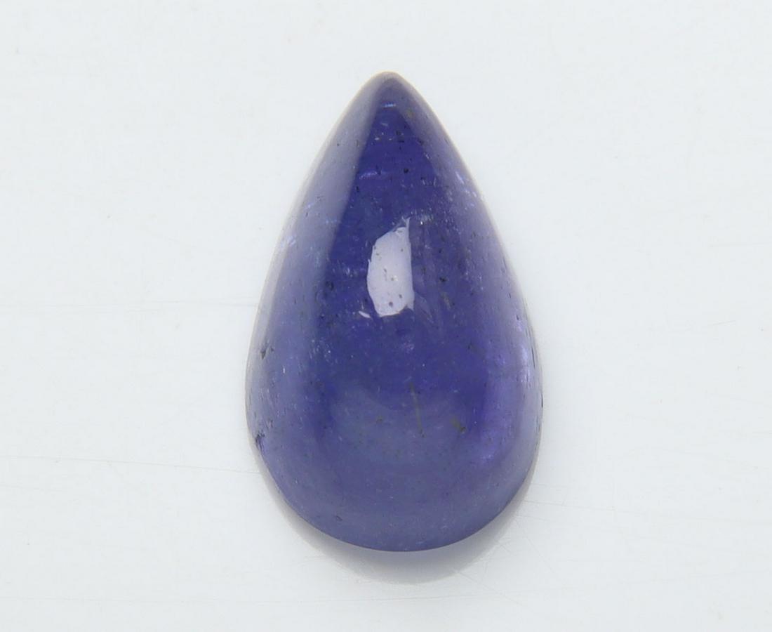 3.78 Cts Natural Tanzanite: No Reserve! Title: 3.78 Cts Natural Tanzanite Additional Information: Gemstone : Natural Tanzanite Origin: Tanzania Weight : 3.78 carats Dimensions : 12x7 mm Shape/Cut: Pear Cabochan Color : Violet Tr