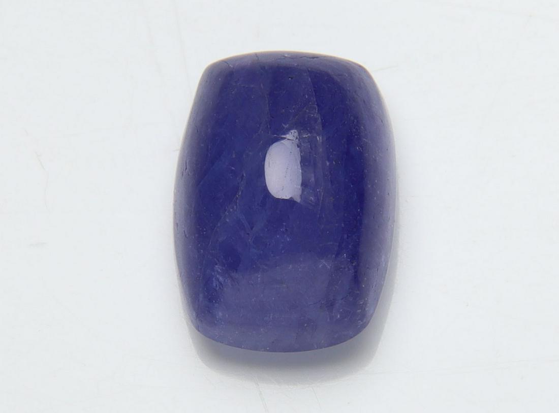 4.67 Cts Natural Tanzanite: No Reserve! Title: 4.67 Cts Natural Tanzanite Additional Information: Gemstone : Natural Tanzanite Origin: Tanzania Weight : 4.67 carats Dimensions : 11x8 mm Shape/Cut: Rectengular Cabochan Color : Vi