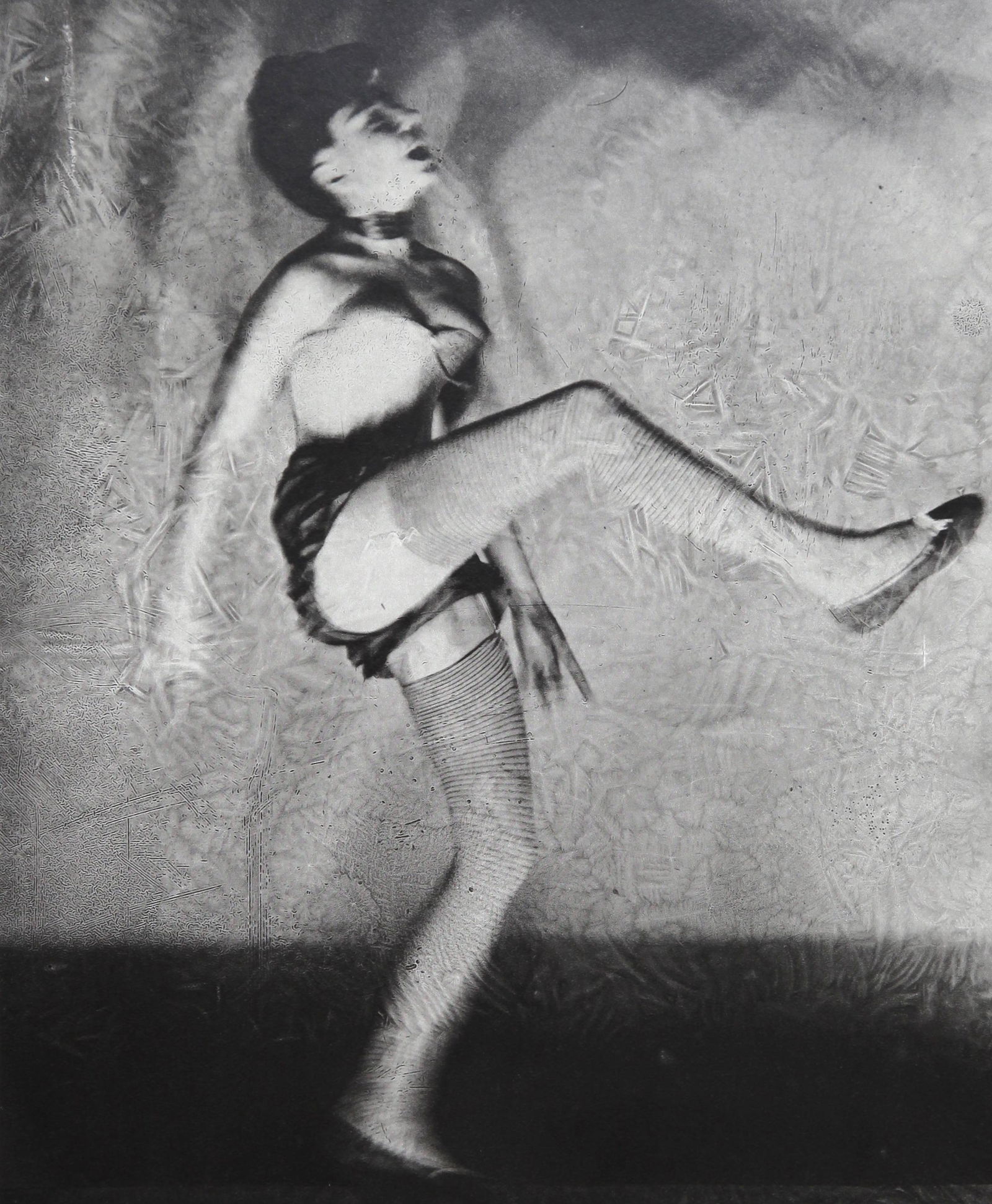 Erwin Blumenfeld: Can Can dancer New York 1943: Artist: Erwin Blumenfeld Title: Can Can dancer New York 1943 Medium: Printed in 1979 Heavy weight paper Print Date: Vintage Photogravure Print Origin: Printed in Italy in 1979 Dimensions: Mount Size: