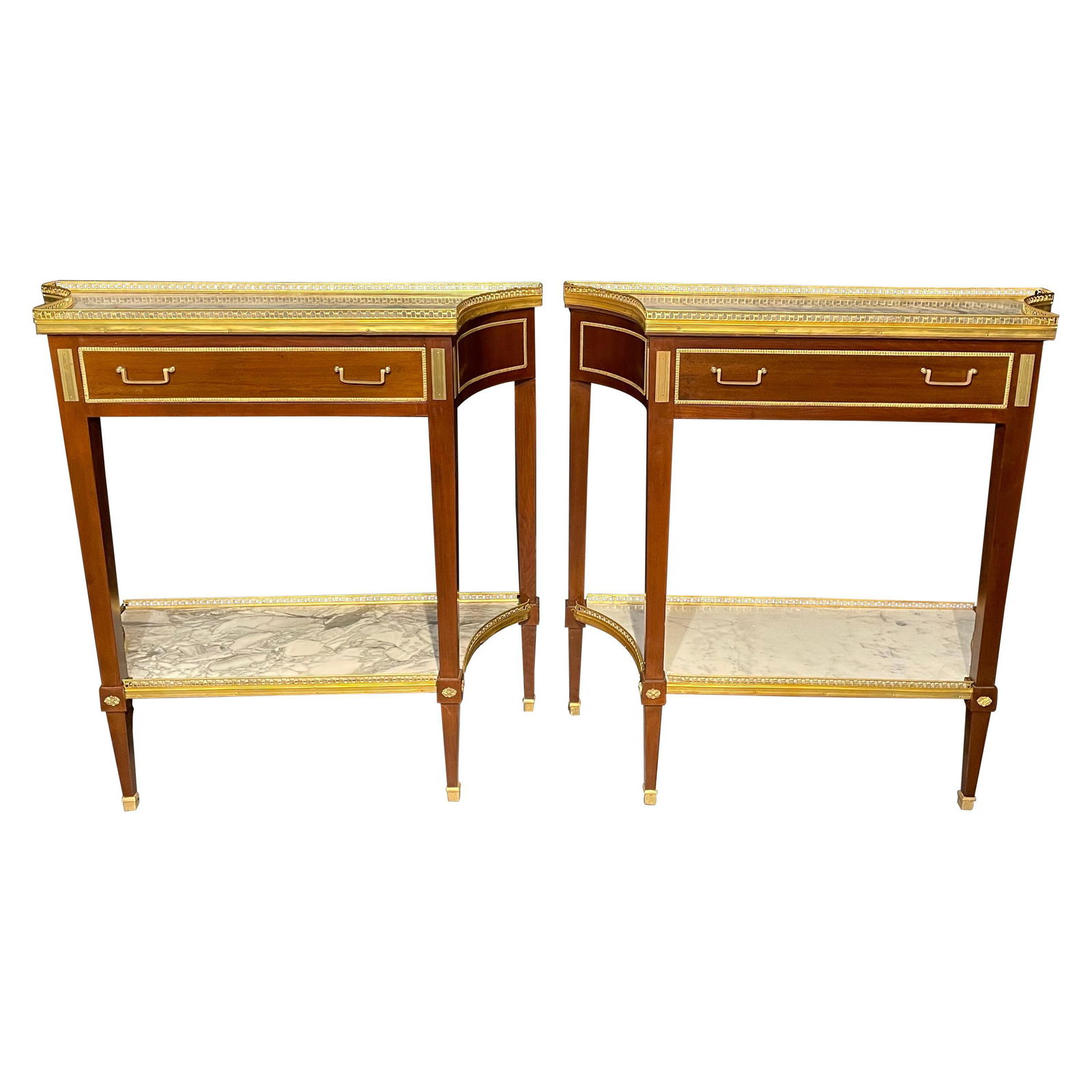 Pair of Russian Neoclassical Console Tables, Sofa Tables or Bedside Stands: A pair of Russian style console tables having the Maison Jansen look and flair for design. This finely crafted and design pair of console, serving or sofa tables have inverted sides sporting a pierced