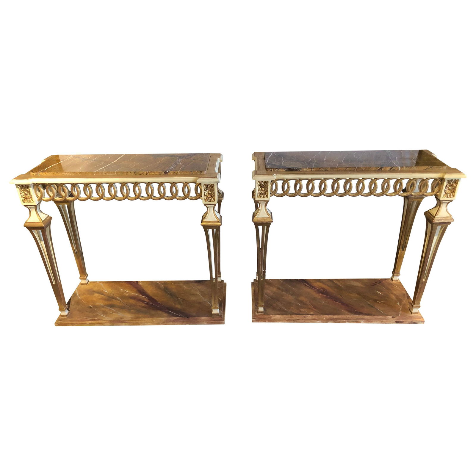 Parcel Paint and Gilt Decorated Pair of Swedish Serving or Console Tables: Stunning pair of parcel paint and gilt decorated Swedish serving or console tables each having a grained marble top. The faux marble base leading to a set of paint and gilt decorated pierced open carv