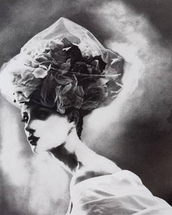 LILLIAN BASSMAN - "Night Hat," Paris 1996: Artist: Lillian BassmanTitle: "Night Hat," by Christian Lacroix Haute Couture, Paris 1996Medium: Photo Litho, 1997, JapanDimensions: 7.4x9.2"Description: Heat Wax Mounted on 11x14" Conservation