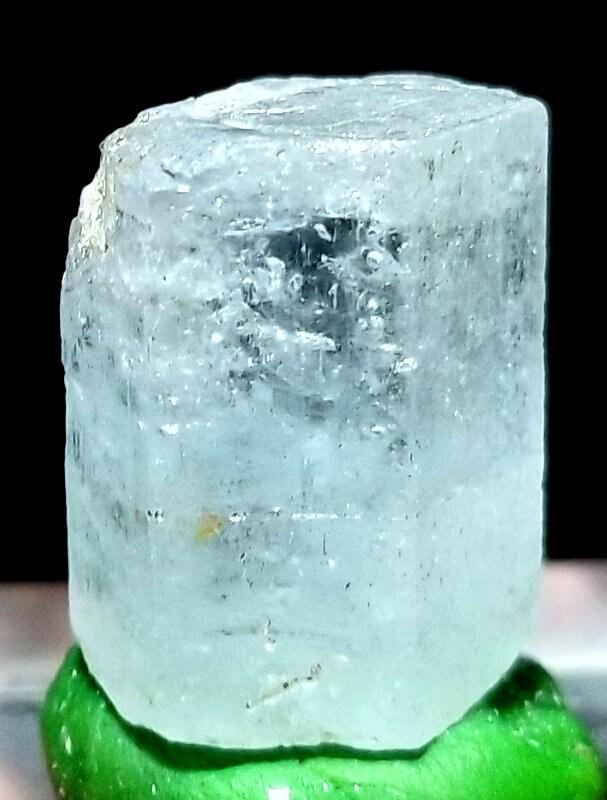11 gram lovely Aquamarine in microlite crystal from skardu pakistan: Description 11 gram lovely Aquamarine in microlite crystal from skardu pakistan size 25mm 19mm 20mm weight 11 gram Reserve: $25.00 Shipping: Domestic: Flat-rate of $10.00 to anywhere within the cont