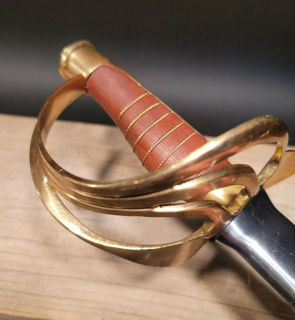 Civil War Wood Handle Heavy Calvary Saber Sword: 40" sword,..41 3/4" Long with steel scabbard The 40" Antique Style Civil War Wood Handle Heavy Calvary Saber Sword is a stunning replica of the swords that were used by heavy cavalry during the Americ