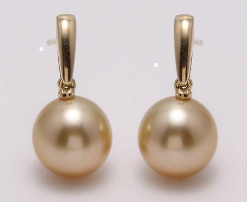 14 kt. Yellow Gold - 10x11mm Golden South Sea Pearls - Earrings: Title: 14 kt. Yellow Gold - 10x11mm Golden South Sea Pearls - Earrings Description: Produced by the gold-lipped Pinctada Maxima Oyster in the warm waters of Indonesia, these pearls have a natural magn