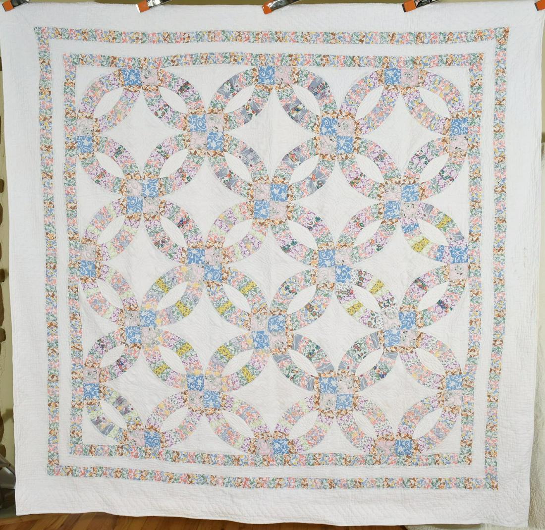30's Double Wedding Ring Quilt, All Prints: Title: 30's Double Wedding Ring Quilt, All Prints Date: 1930's Origin: Ohio Material: Cotton Dimension [INCHES]: 80" X 80" Provenance: Cotton 30's double wedding ring quilt, all hand pieced and hand q