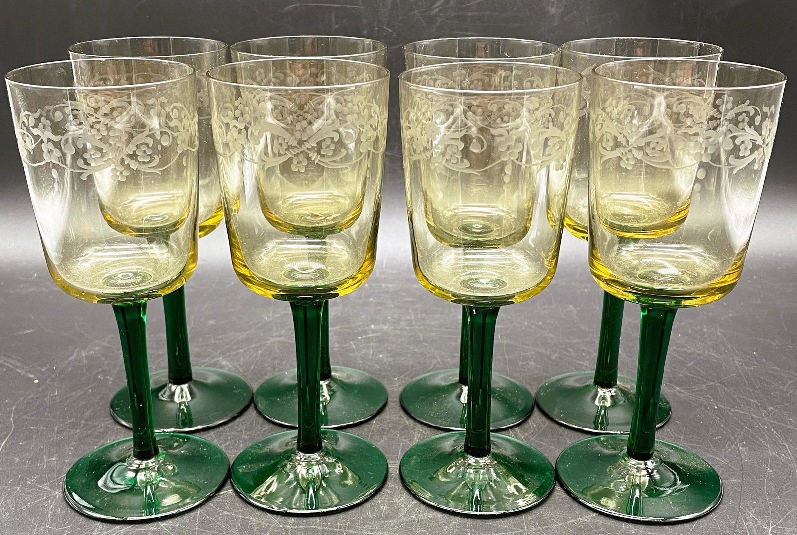 Gorgous Set of Green Stemmed Etched Wine Glasses with Yellow accent: Title: Gorgous Set of Green Stemmed Etched Wine Glasses with Yellow accent Date/Period: unknown Dimension: approx 5.75 tall x 2" diameter across top Material: glass Additional Information: Gorgous Set
