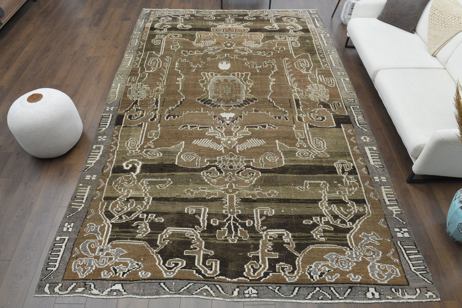 Turkish Antique Handmade Wool Rug: Title: Turkish Antique Handmade Wool Rug Origin: Turkey Date/Period: 1960 - 1970 Dimension: Width: 9.8 feet Length: 13.1 feet Materials: Wool and Cotton Description: This Turkish one-of-a-kind Anatoli