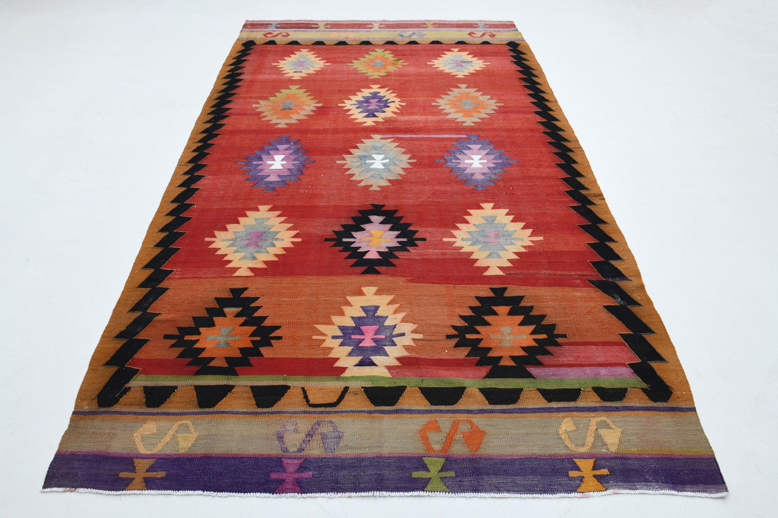 6.4x10.7 Ft Turkish Antique Oushak Wool Rug: Title: 6.4x10.7 Ft Turkish Antique Oushak Wool Rug Origin: Turkey Date/Period: 1960 - 1970 Dimension: Width: 6.4 feet Length: 10.7 feet Materials: Wool and Cotton Description: This Turkish one-of-a-ki