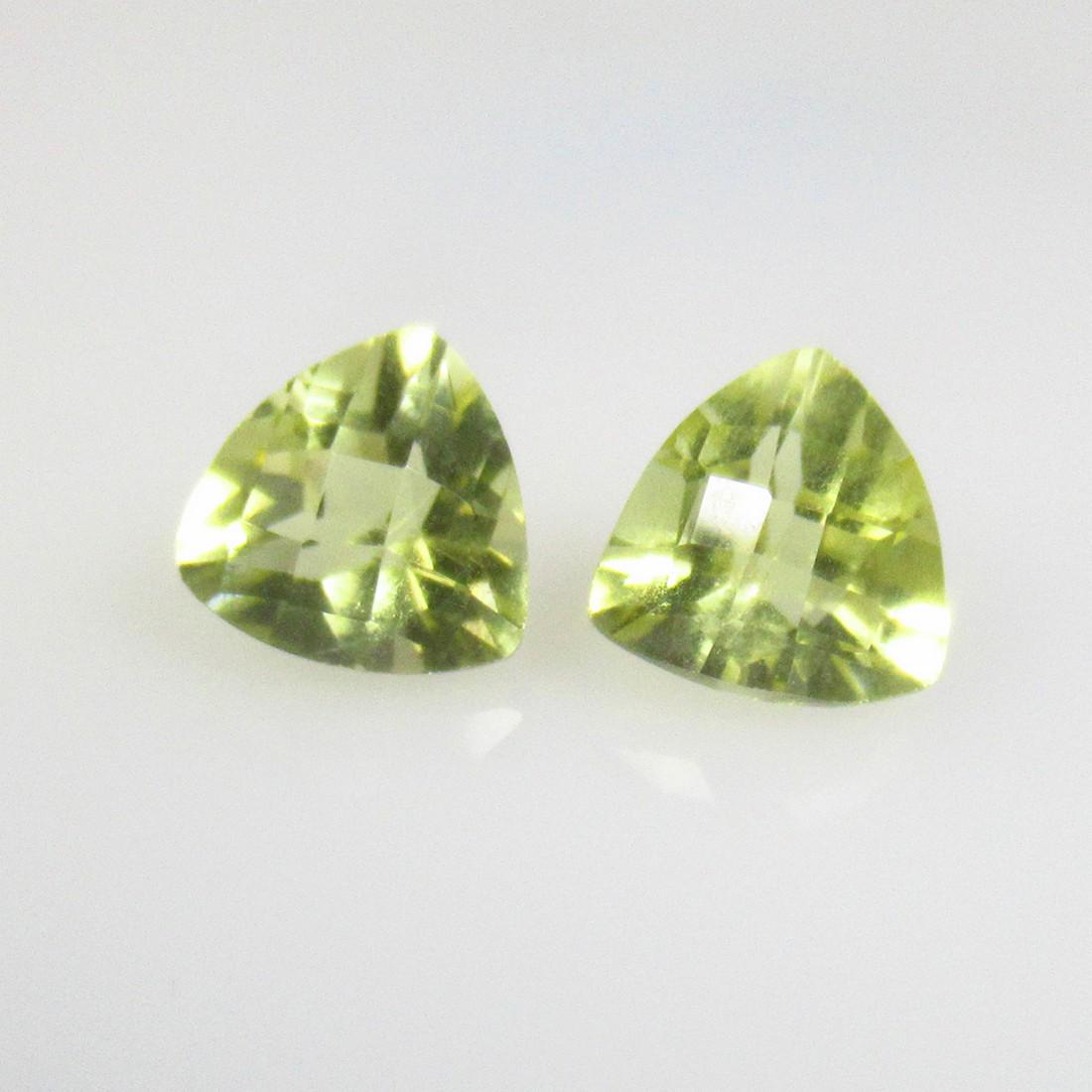 3.83 Ctw Natural Lemon Quartz Trillion Pair: No Reserve! Title: 3.83 Ctw Natural Lemon Quartz Trillion Pair Stone Clarity: VVS Gemstones: Natural Lemon Quartz Carat Weights: 3.83 Size/Dimensions: 8.20 x 8.20 x 6.10 mm / 2 Pc's Additional Informa