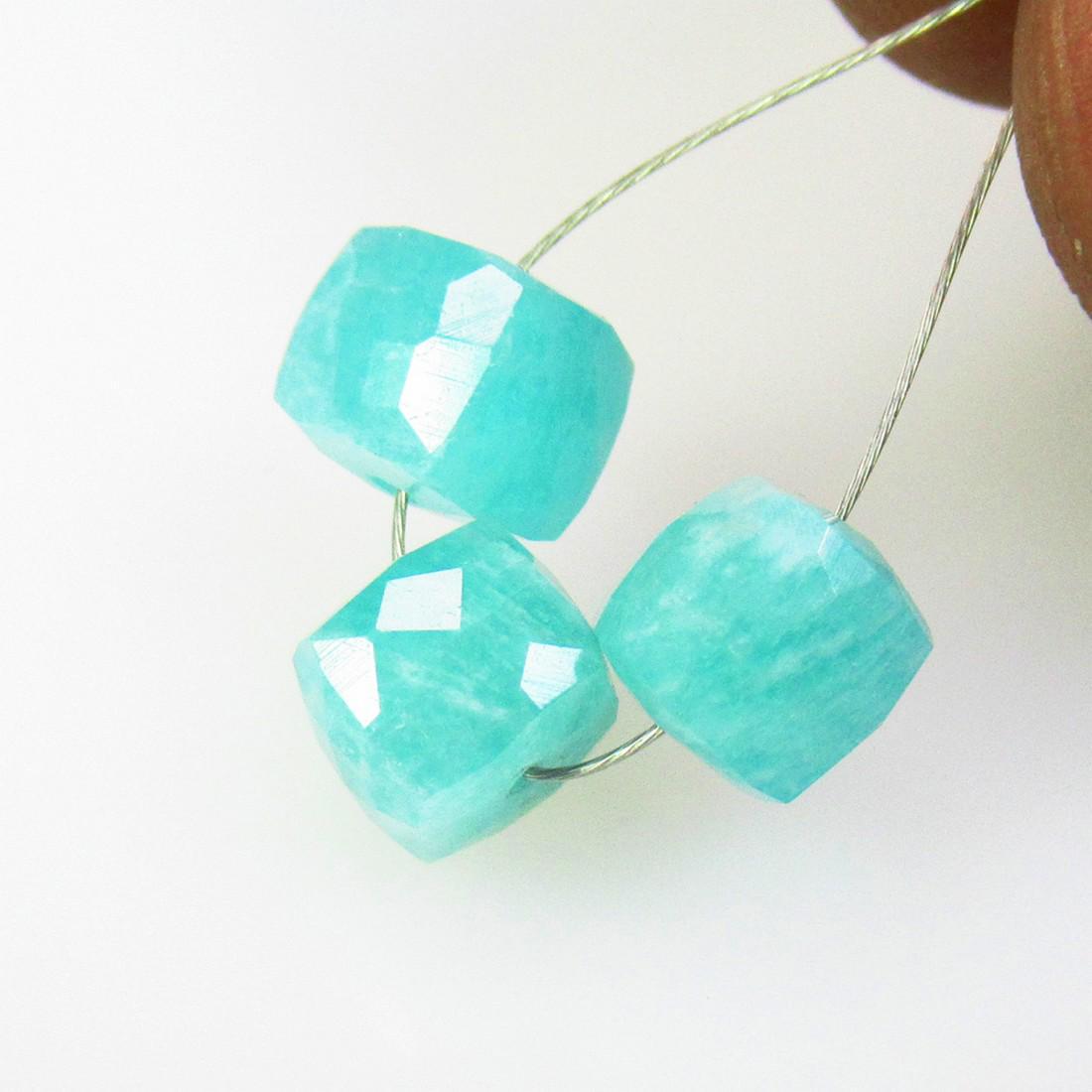 7.13 Ctw Natural 3 Drilled Amazonite Square Beads: No Reserve! Title: 7.13 Ctw Natural 3 Drilled Amazonite Square Beads Stone Clarity: Opaque Gemstones: Natural Amazonite Beads Carat Weights: 7.13 Size/Dimensions: 6.20 x 6.00 - 7.00 x 6.20 mm / 3 P'cs