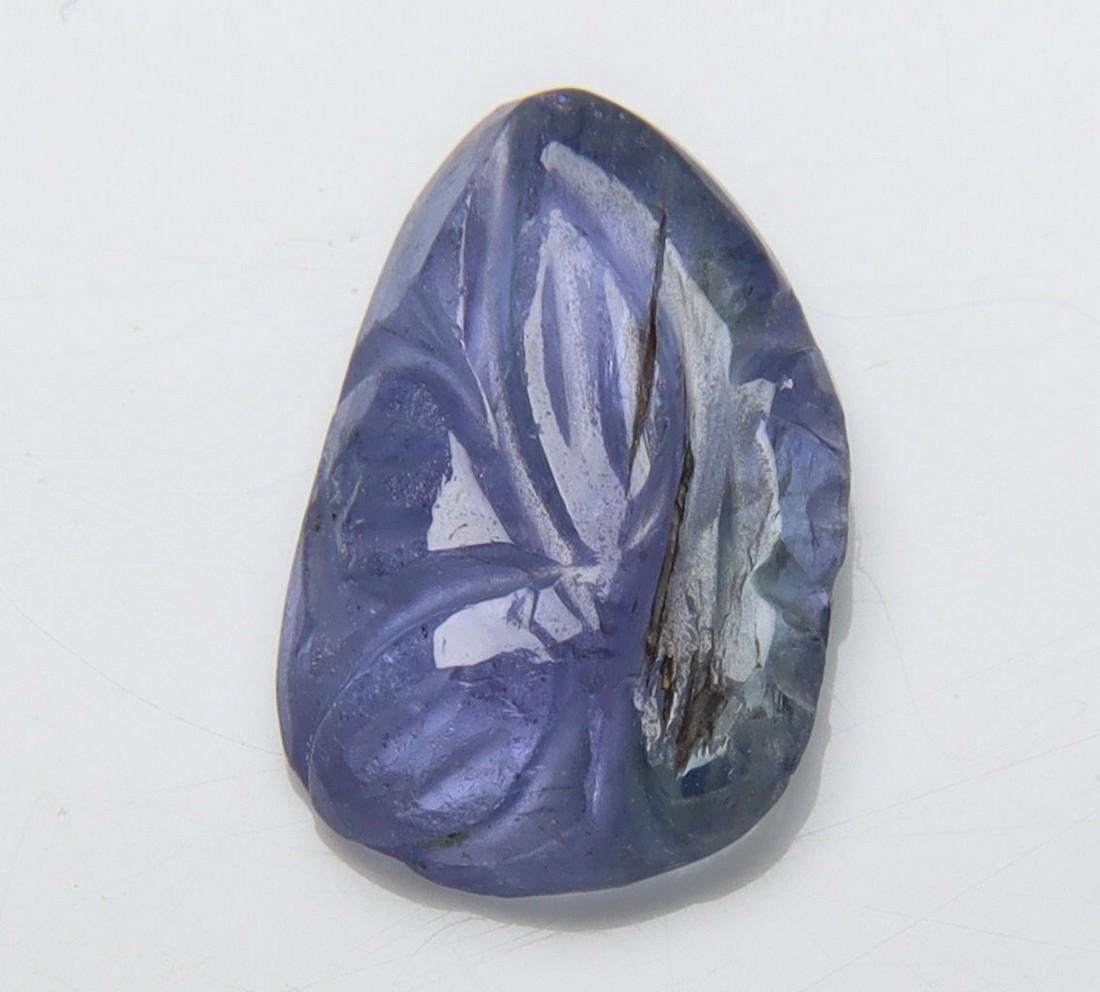2.43 Cts Natural Carving Tanzanite: No Reserve! Title: 2.43 Cts Natural Carving Tanzanite Additional Information: Gemstone : Natural CarvingTanzanite Origin: Tanzania Weight : 2.43 carats Dimensions : 11.49x7.50x2.89 mm Shape/Cut: Fancy