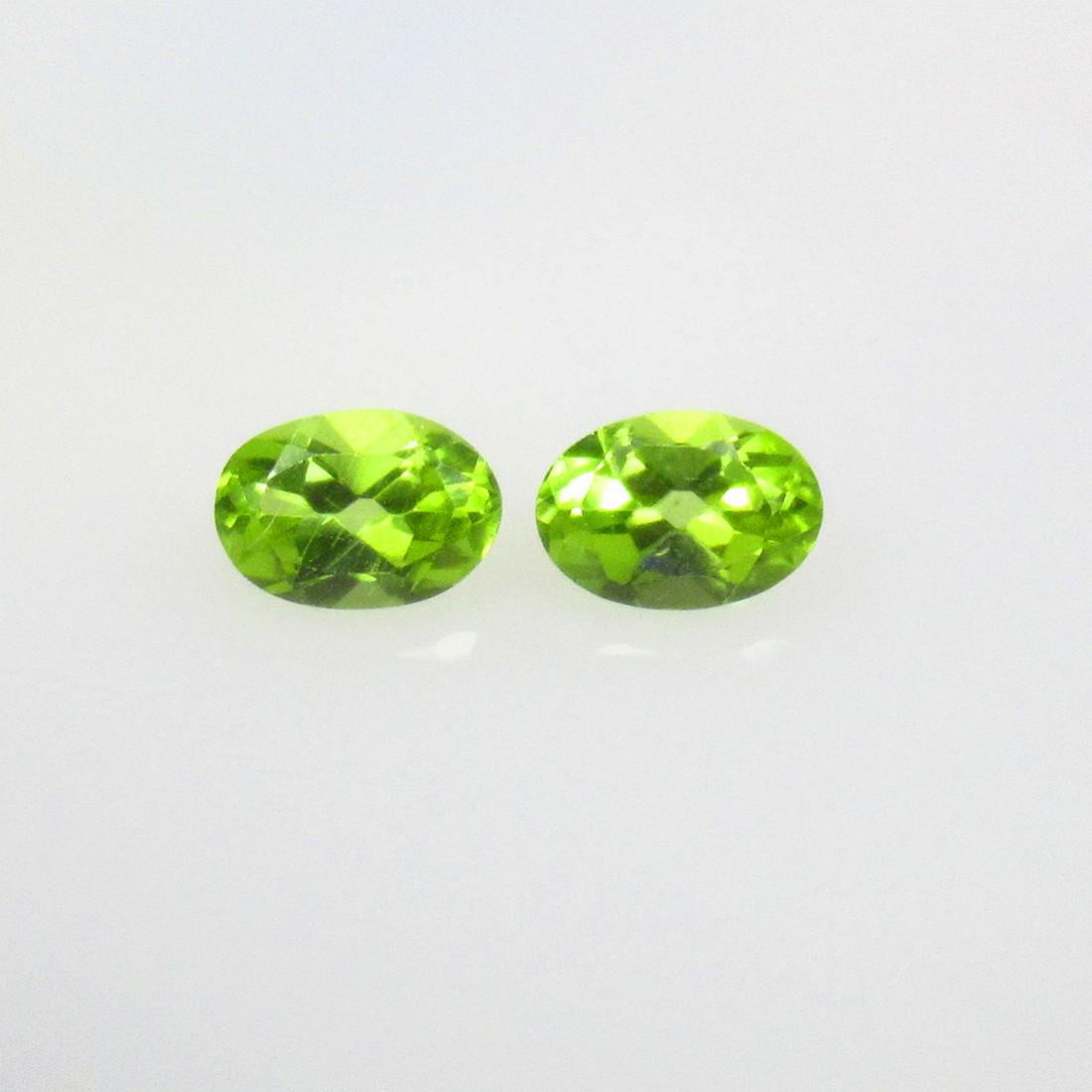 1.18 Ctw Natural Pakistan Peridot Cushion Pair: No Reserve! Title: 1.18 Ctw Natural Pakistan Peridot Cushion Pair Stone Clarity: VVS Gemstones: Natural Peridot Carat Weights: 1.18 Size/Dimensions: 6.00 x 4.10 x 3.20 mm / 2 Pc's Additional Informati