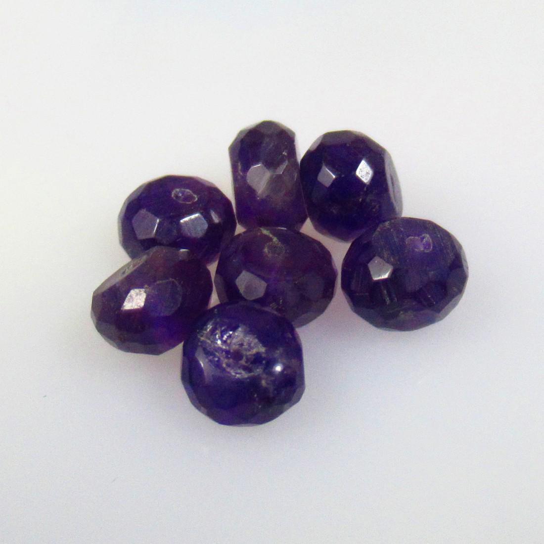 9.06 Ctw Natural 7 Drilled Purple Amethyst Round Beads: No Reserve! Title: 9.06 Ctw Natural 7 Drilled Purple Amethyst Round Beads Stone Clarity: VVS Gemstones: Natural Amethyst Beads Carat Weights: 9.06 Size/Dimensions: 6.10 - 6.60 mm / 7 Pc's Additional I