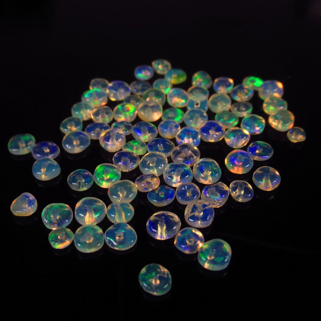 Natural Multicolor Opal Beads - 5.25 Ct: No Reserve! Title: Natural Multicolor Opal Beads - 5.25 Ct Origin: Ethiopia Weight: 5.25 Size/Dimensions: 3.0 - 3.6 mm Additional Information: Pieces : 72 No's / Shape : Drilled Round Beads / Clarity 