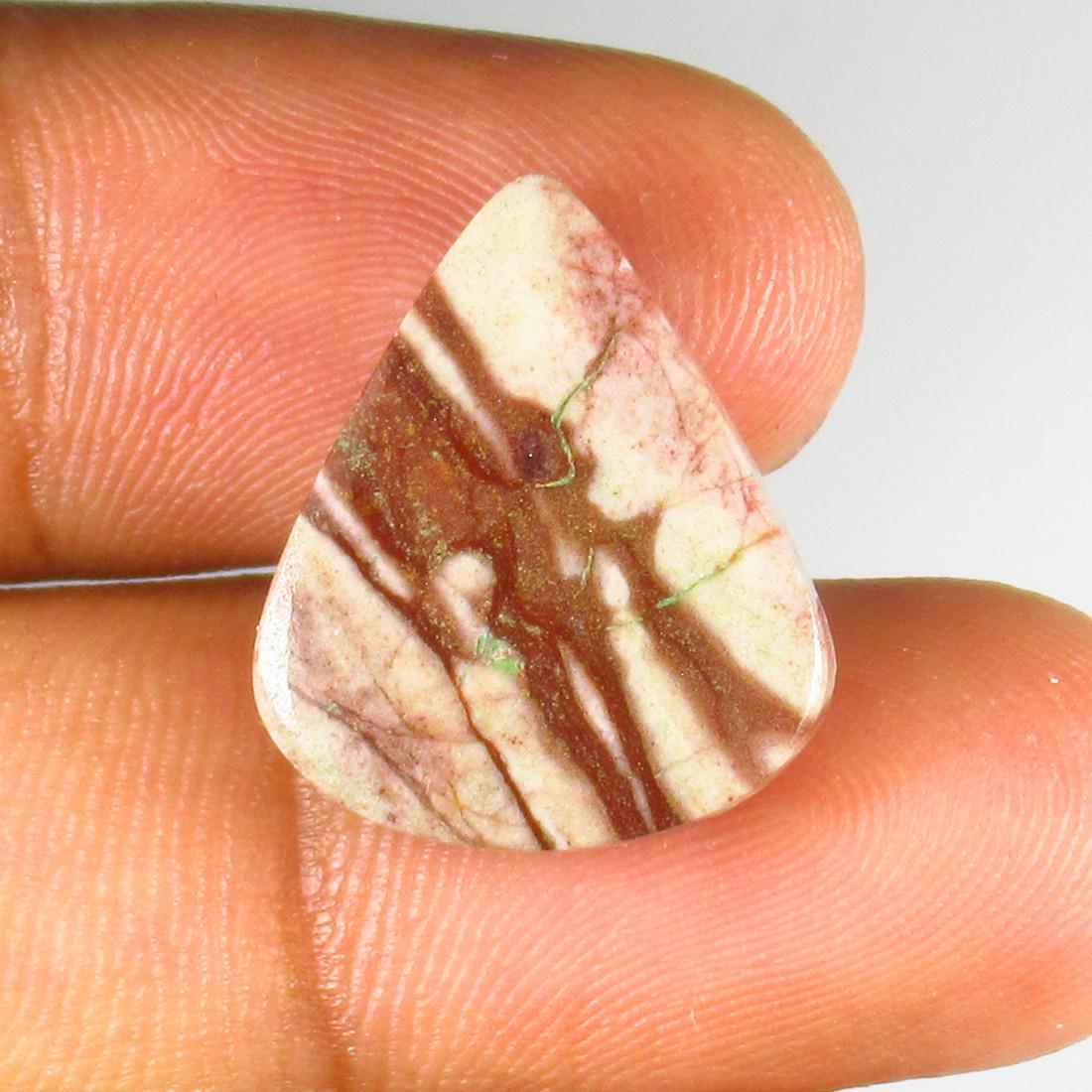 Natural Mookaite Jasper - 12.19 Ct: No Reserve! Title: Natural Mookaite Jasper - 12.19 Ct Origin: Brazil Weight: 12.19 Size/Dimensions: 19.5 x 17.0 x 5.0 mm Additional Information: Pieces : 1 No's / Shape : Pear Cabochon / Color : Orang