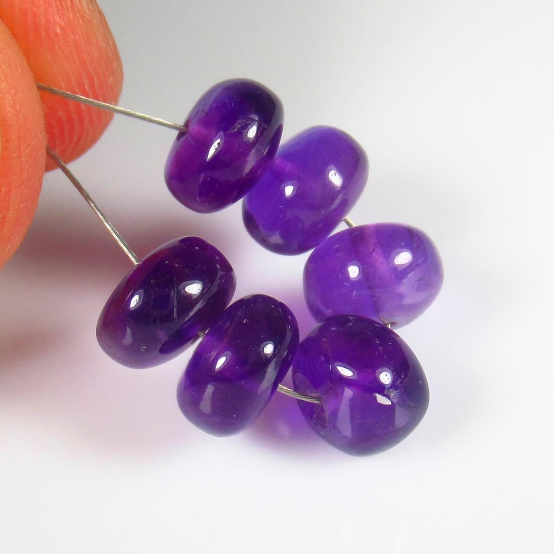 Natural Purple Amethyst Beads - 11.51 Ct: No Reserve! Title: Natural Purple Amethyst Beads - 11.51 Ct Origin: Brazil Weight: 11.51 Size/Dimensions: 7.0 - 7.5 mm Additional Information: Pieces : 6 No's / Shape : Drilled Round Beads / Color : P