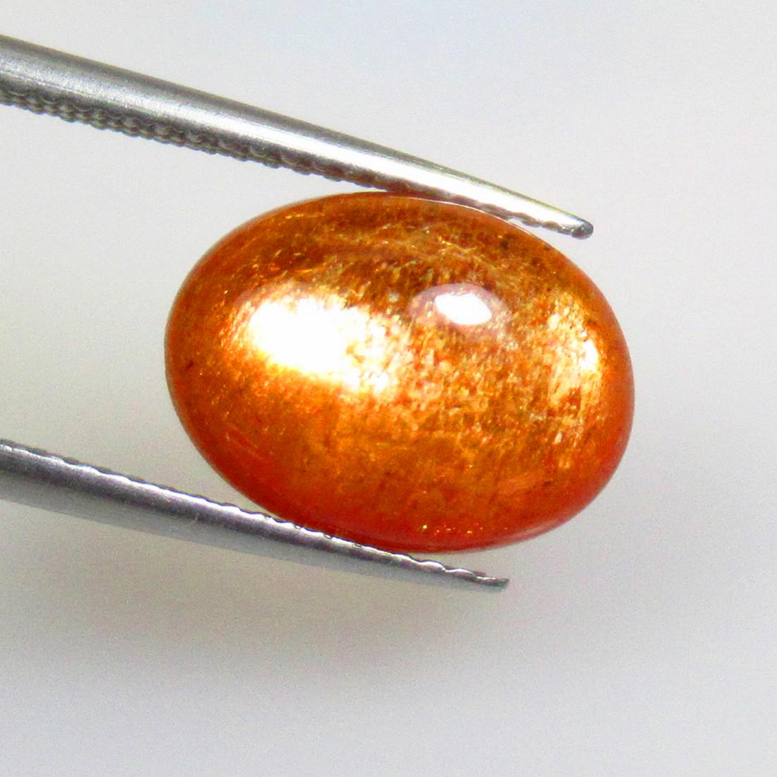 3.82 Ctw Natural Sunstone Oval Cab: No Reserve! Title: 3.82 Ctw Natural Sunstone Oval Cab Stone Clarity: Opaque Gemstones: Natural Sunstone Catseye Carat Weights: 3.82 Size/Dimensions: 12.80 x 9.50 x 4.50 mm Additional Information: Exce