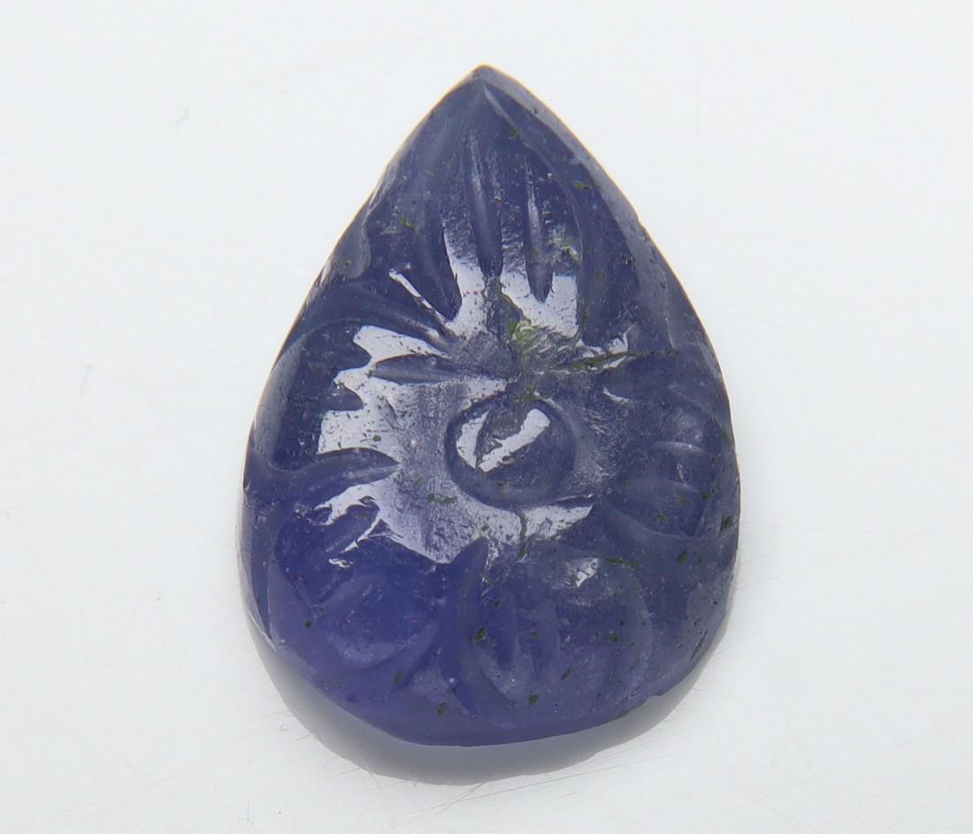 7.98 Cts Natural Carving Tanzanite: No Reserve! Title: 7.98 Cts Natural Carving Tanzanite Additional Information: Gemstone : Natural CarvingTanzanite Origin: Tanzania Weight : 7.98 carats Dimensions : 16.25x11.36x4.56 mm Shape/Cut: Pear