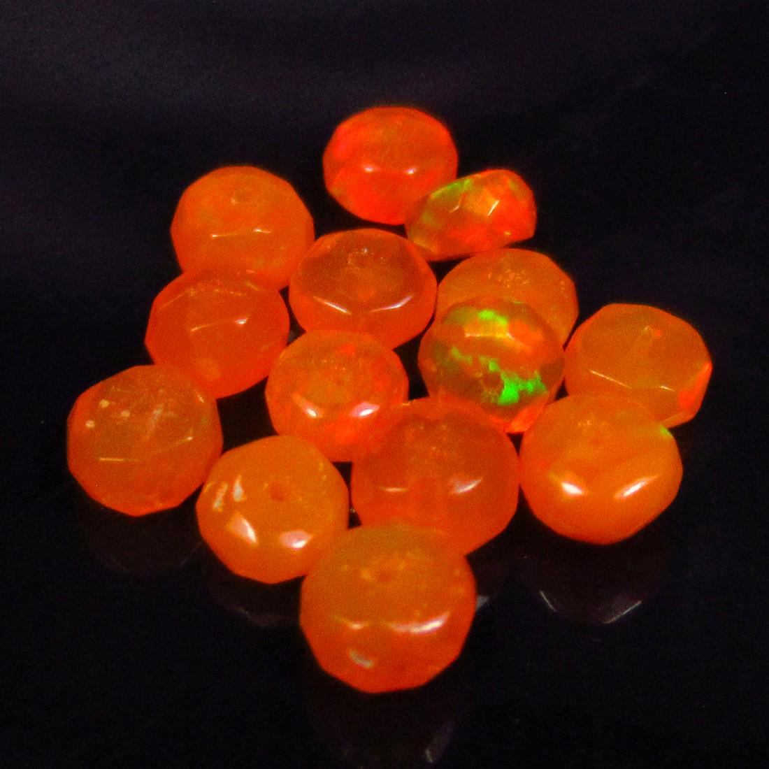 4.73 Ctw Natural 14 Drilled Orange Fire Opal Beads: No Reserve! Title: 4.73 Ctw Natural 14 Drilled Orange Fire Opal Beads Stone Clarity: Transparent Gemstones: Natural Opal Beads Carat Weights: 4.73 Size/Dimensions: 4.60 to 5.10 mm / 14 PC's Additional