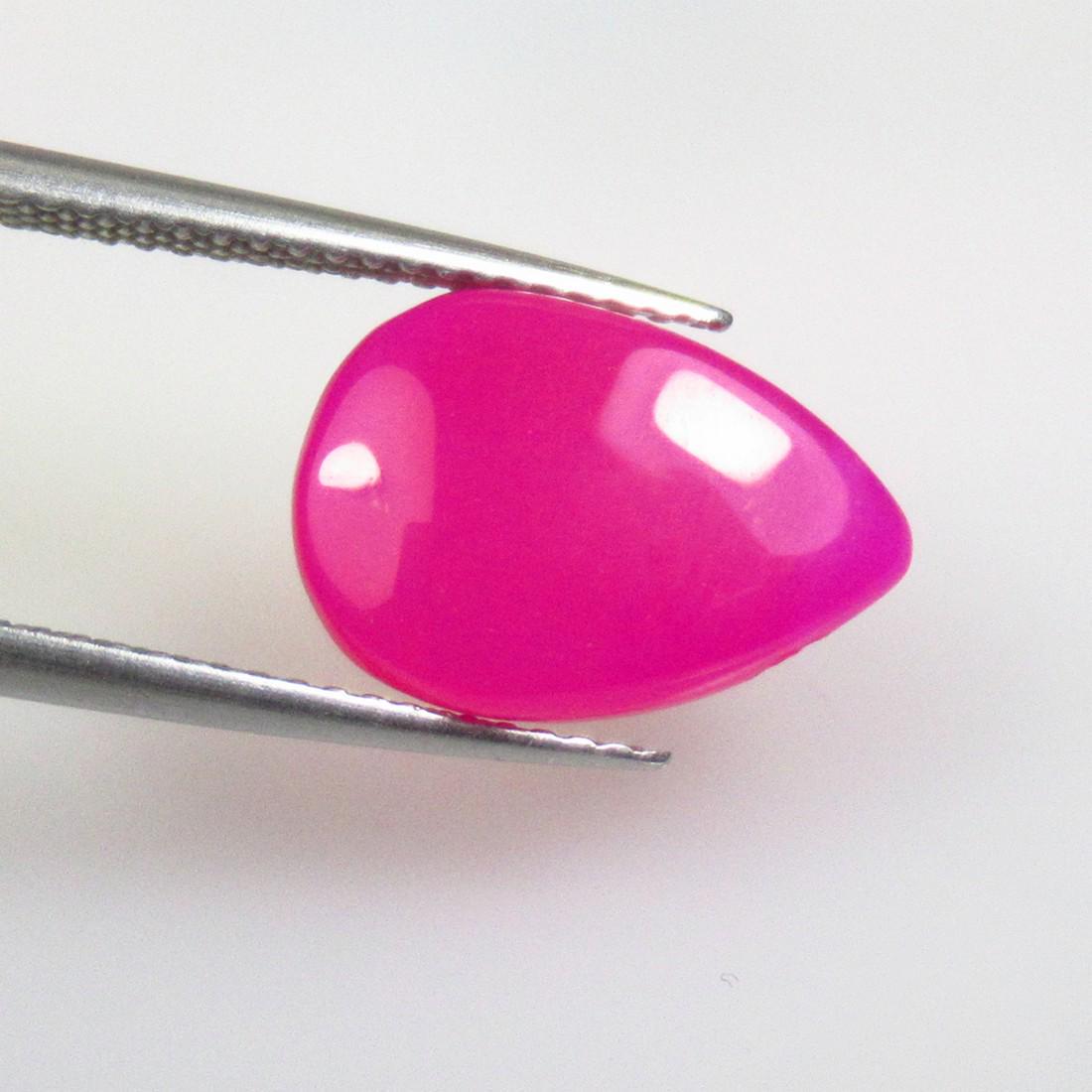 3.42 Ctw Natural Drilled Pink Onyx Pear Cab: No Reserve! Title: 3.42 Ctw Natural Drilled Pink Onyx Pear Cab Stone Clarity: Opaque Gemstones: Natural Onyx Carat Weights: 3.42 Size/Dimensions: 14.00 x 9.90 x 3.40 mm Additional Information: Very Go