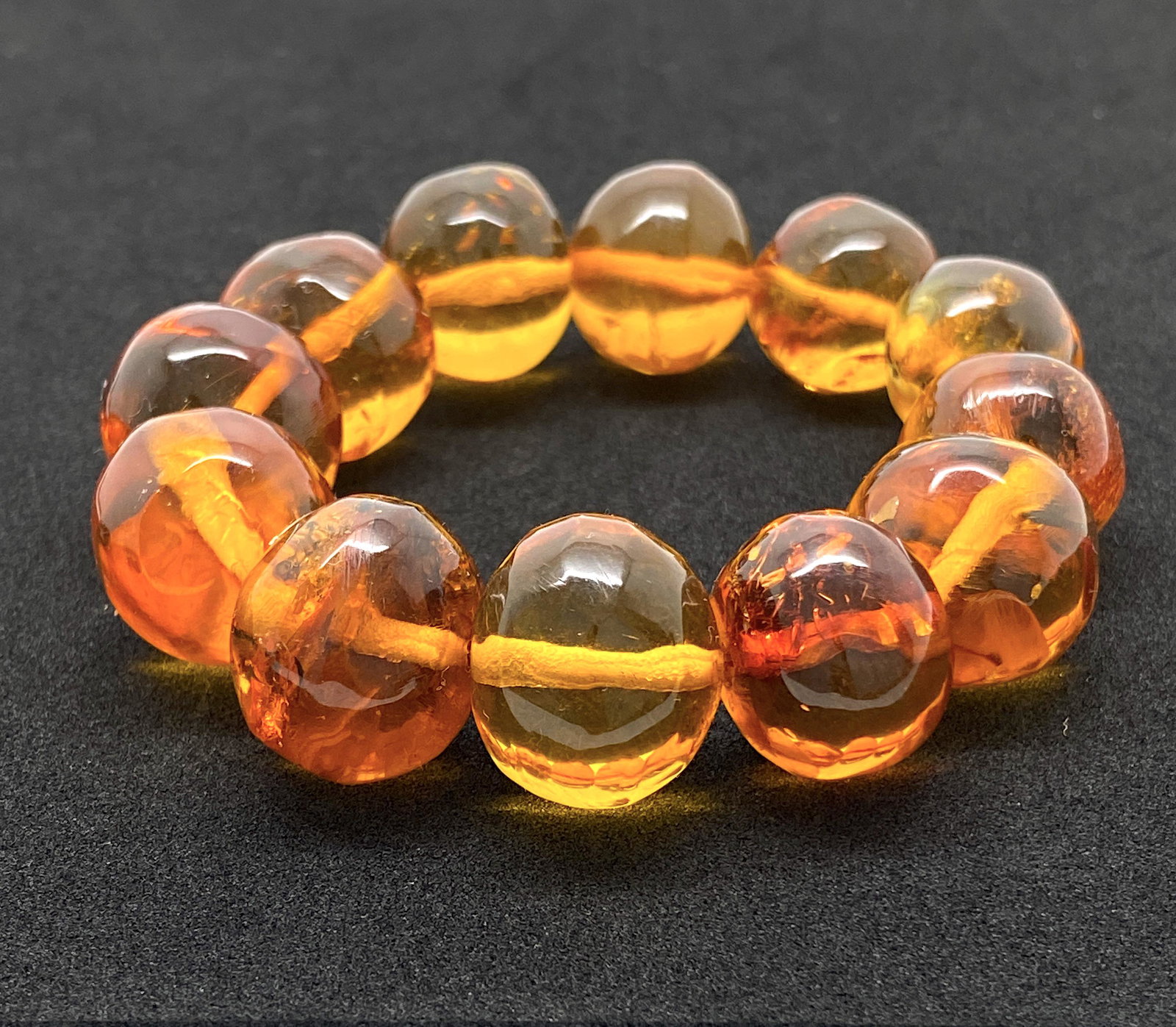 Outstanding Amber Bracelet made from Hand Carved Amber beads: Title: Outstanding Amber Bracelet made from Hand Carved Amber beads Metal: None Gemstones: Amber Weight: 34.2 g Size: Bead size: From 16.0 to 20.0 mm Bead size: 0.63 to 0.787 inches Made of: Whole Sto