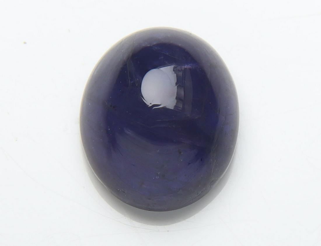 Top Intense Blue 3.04 Cts Natural Iolite: No Reserve! Title: Top Intense Blue 3.04 Cts Natural Iolite Additional Information: Gemstone : Natural Iolite Shape and Cut : Oval Cabochon Weight : 3.04 Carats Measurements : 10.32x8.50x5.18 mm Color