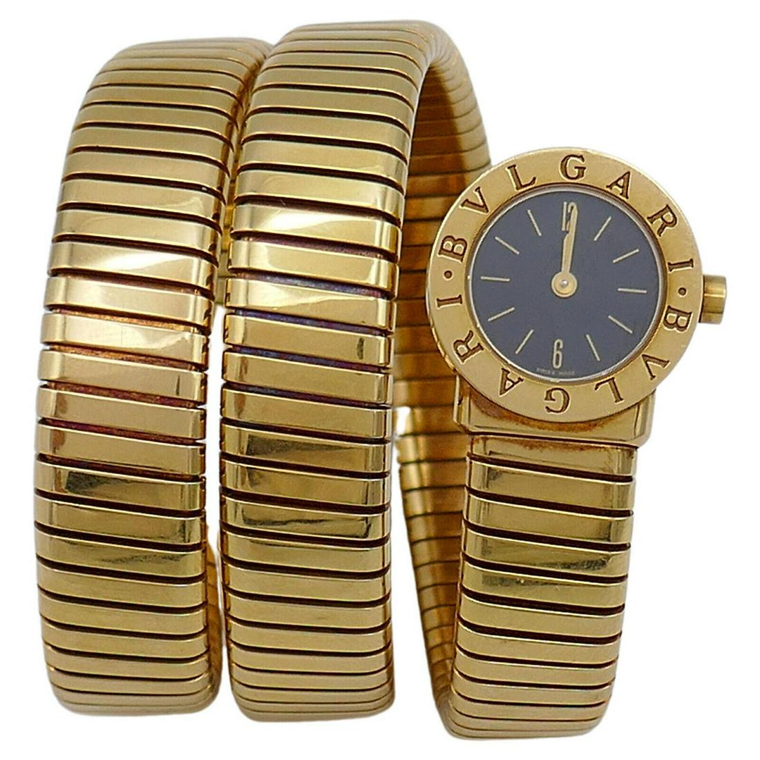 Bulgari Tubogas Gold Wrap Watch: NS JATOO A Bulgari Tubogas 18k gold triple wrap watch. The 18k gold case with a snap-on case back is stamped with the maker's mark, a model, a serial number and a country of origin (Switzerland). Equi