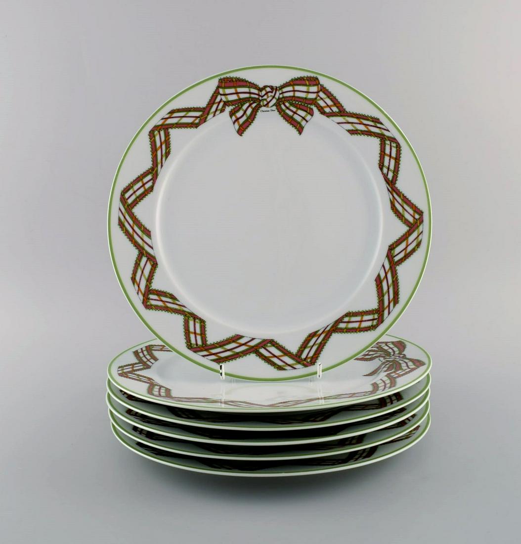 Limoges, France. Six rare Christian Dior "Spring" porcelain dinner plates decorated with ribbon and (1 of 5)
