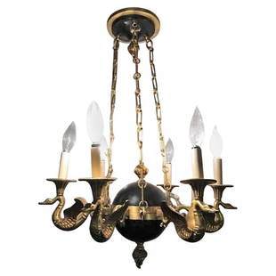 Regency Style Six-Arm Bronze Swan Decorated Chandelier: A regency style six-arm bronze swan decorated chandelier. This six-arm chandelier depicting swans chained to a centre ball decorated with a ebony finish. The whole supported by a set of three chains