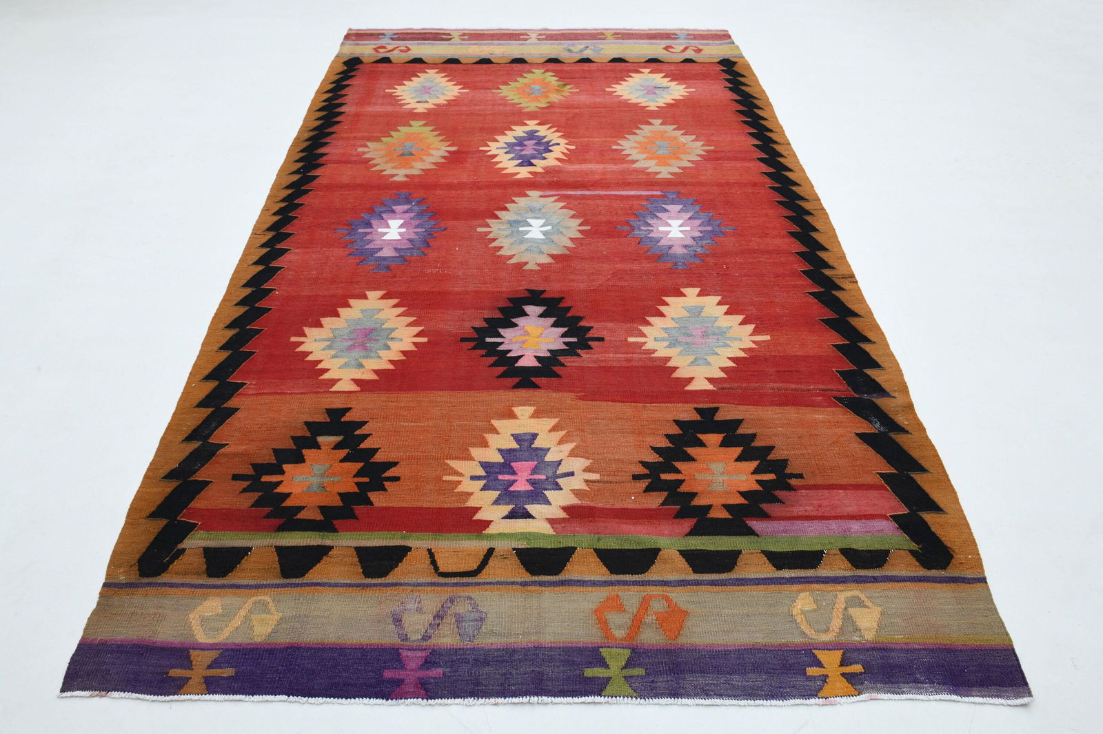 6.4x10.7 Ft Turkish Antique Oushak Wool Rug: Title: 6.4x10.7 Ft Turkish Antique Oushak Wool Rug Origin: Turkey Date/Period: 1960 - 1970 Dimension: Width: 6.4 feet Length: 10.7 feet Materials: Wool and Cotton Description: This Turkish one-of-a-ki