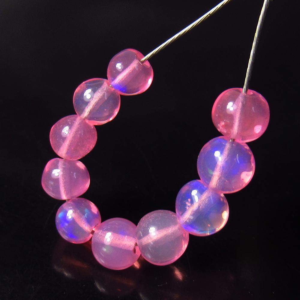 2.10 Ctw Natural 10 Drilled Pink Fire Opal Beads: No Reserve! Title: 2.10 Ctw Natural 10 Drilled Pink Fire Opal Beads Stone Clarity: Transparent Gemstones: Natural Opal Beads Carat Weights: 2.10 Size/Dimensions: 3.30 to 3.80 mm / 10 PC's Additional I