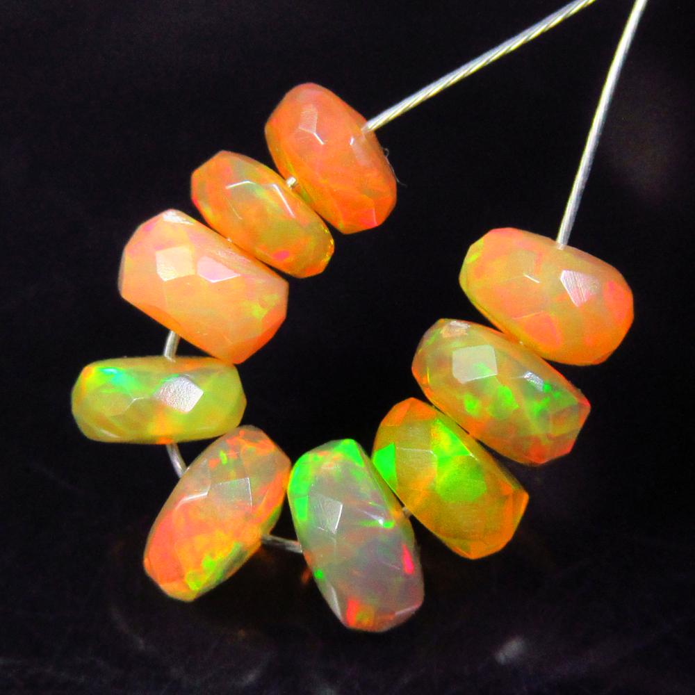 3.85 Ctw Natural 9 Drilled Faceted Fire Opal Beads: No Reserve! Title: 3.85 Ctw Natural 9 Drilled Faceted Fire Opal Beads Stone Clarity: Transparent Gemstones: Natural Faceted Fire Opal Beads Carat Weights: 3.85 Size/Dimensions: 4.60 to 5.60 mm / 9 PC'