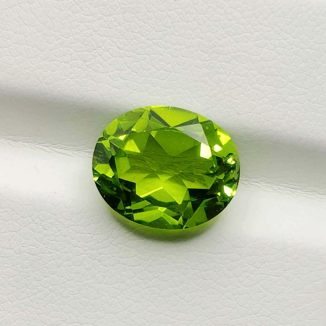 5.95 ct Natural Chartreuse Quartz: No Reserve! Title: 5.95 ct Natural Chartreuse Quartz Additional Information: Gemstones: Natural Chartreuse Quartz Carat Weights: 5.95 ct Size/Dimensions: 12 X 10 mm Treatment: Coated Materials & Techn