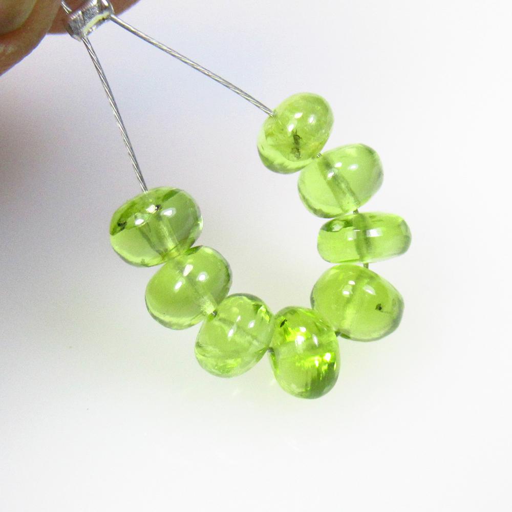 6.57 Ctw Natural 8 Pakistan Peridot Drilled Round Beads: No Reserve! Title: 6.57 Ctw Natural 8 Pakistan Peridot Drilled Round Beads Stone Clarity: Transparent Gemstones: Natural Peridot Beads Carat Weights: 6.57 Size/Dimensions: 4.90 to 5.20 mm / 8 PC's Add